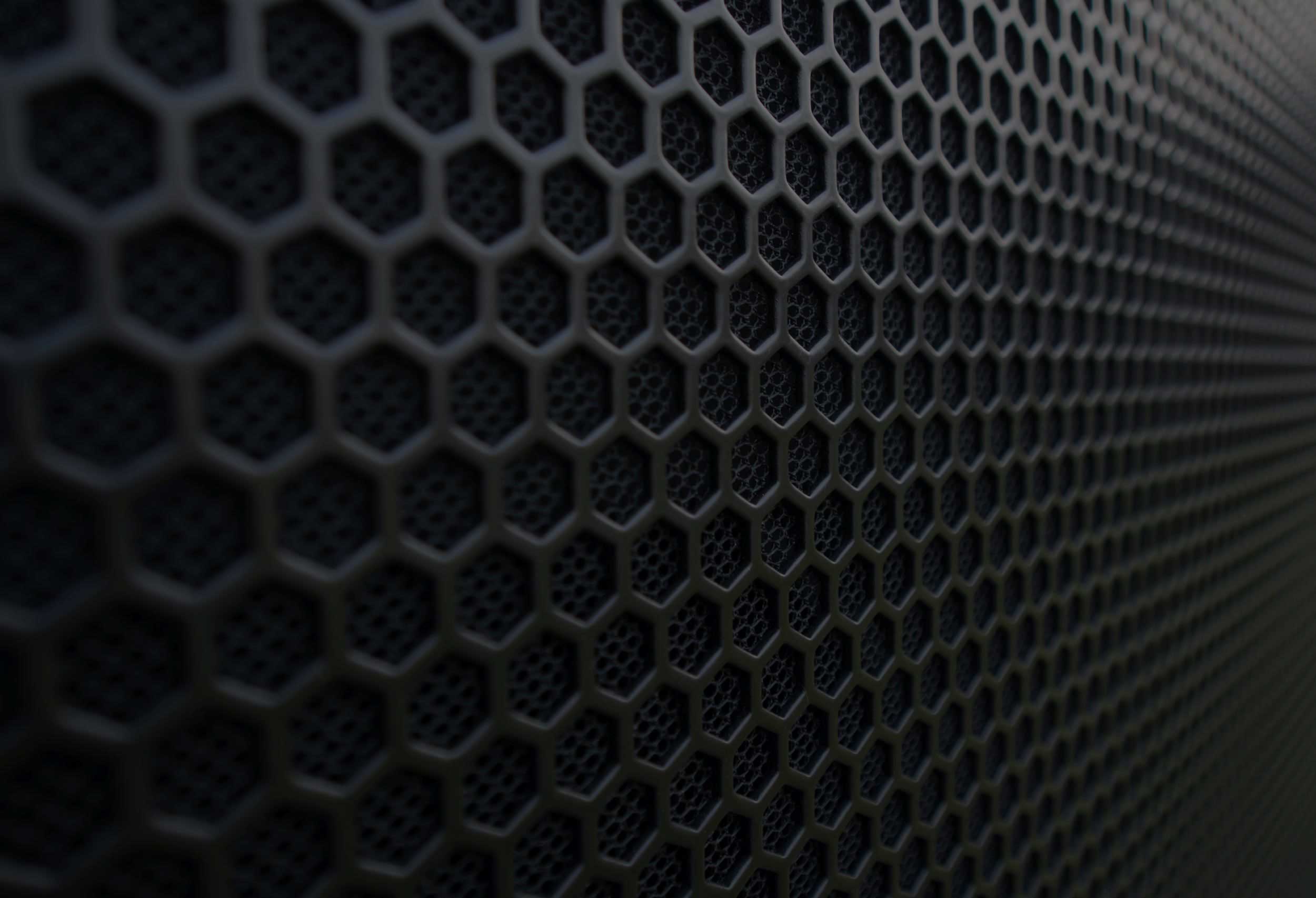Artistic close up of speaker grille.